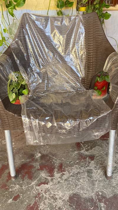 12 plastic chairs and 3 tables brand new