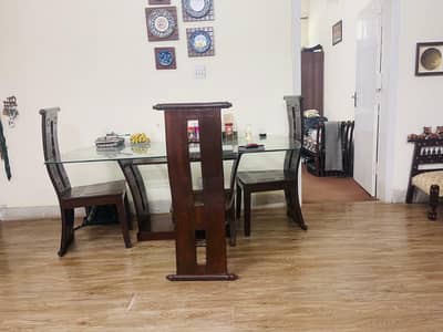 wooden dining table set with 6 chairs and glass top