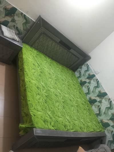 king size bed with two side tables