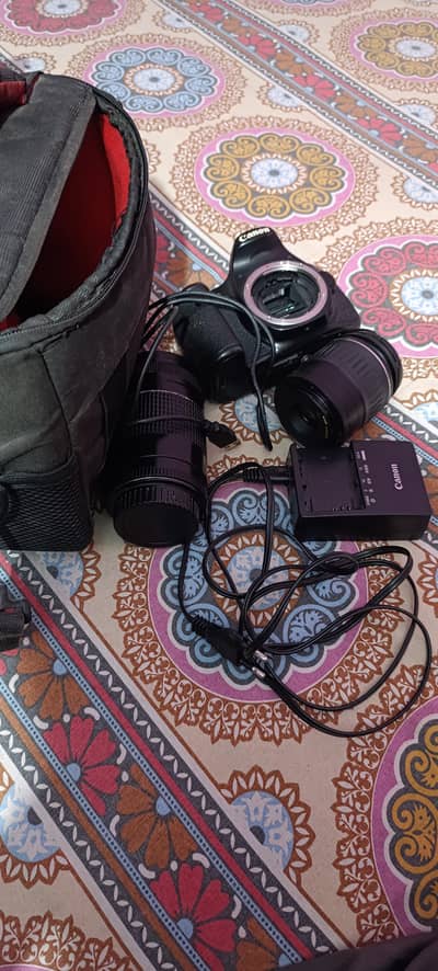 Canon 60D DSLR + 2 Lenses (75-300mm & 28-90mm) + Camera Bag – 47,000