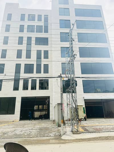 1 KANAL 7 STORY COMMERCIAL BUILDING, 2 LIFTS, M/F WASHROOMS NEAR CANAL FOR RENT