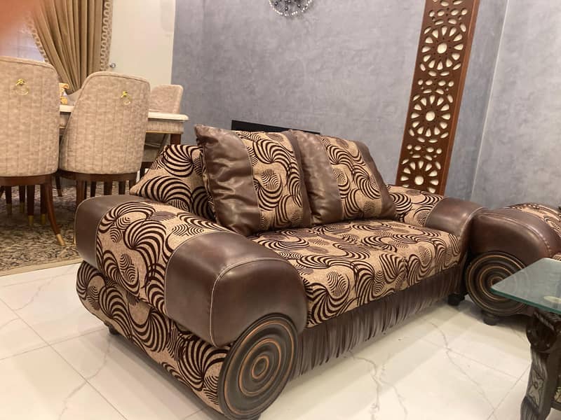 Leather sofas with cushions and table 1