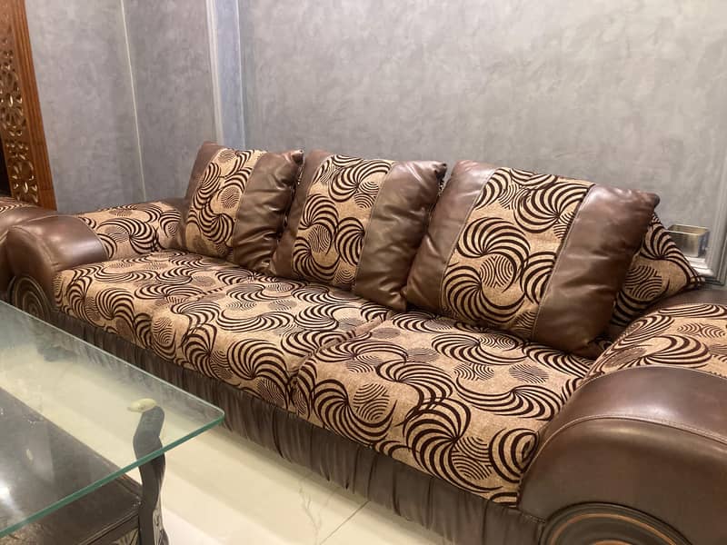 Leather sofas with cushions and table 2