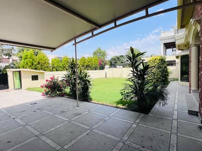 2 Kanal House for Rent Near Ghazi Road with Lush Green Lawn Very Reasonable Demand