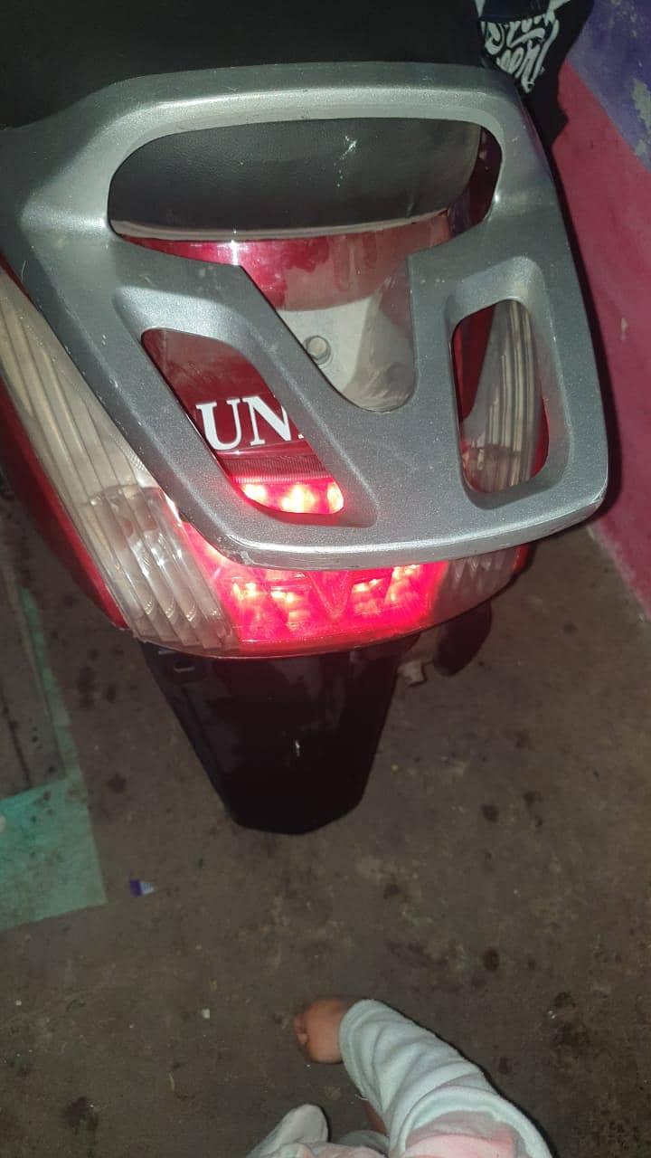 united 100cc 5