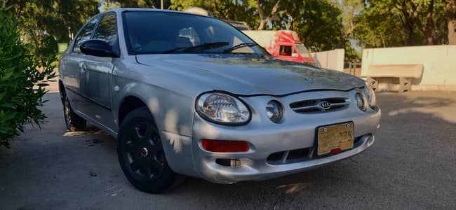 Kia spectra b/than alto,cuore,cultus,Corolla,civic