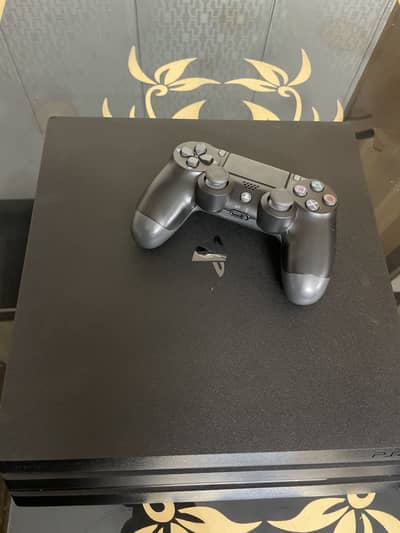 PS4 Pro 1TB + 1 Controller + 2 Games – Excellent Condition