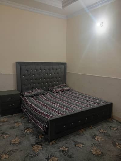 king size bed with mattress and one side table