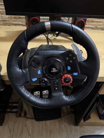 logitech g29 steering wheel and gaming monitor red dragon