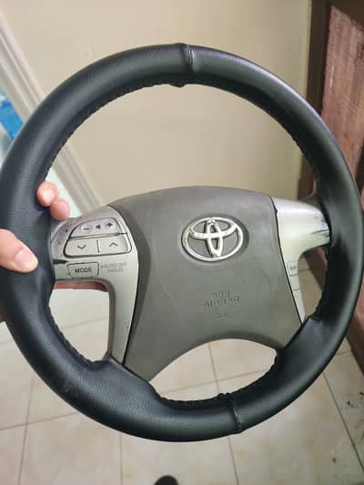 Corolla steering wheel with multimedia buttons