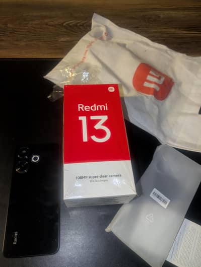 Xiaomi Redmi 13 in warranty. . . .