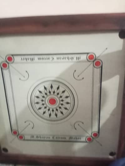 carrom board hai ok hai ziada istemal nhi howa hai