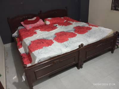 wooden single bed