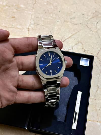 TOMI Watch