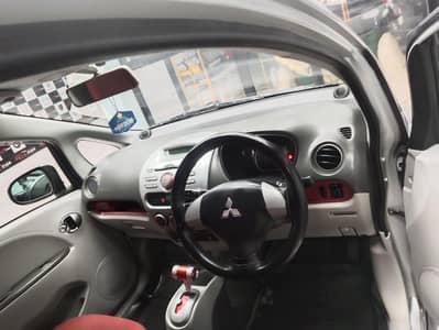 Mitsubishi i 12× 6 beautiful car