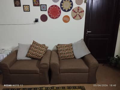 ALMOST BRAND NEW SOFA SET WITH JUITE COVERING FOR SALE