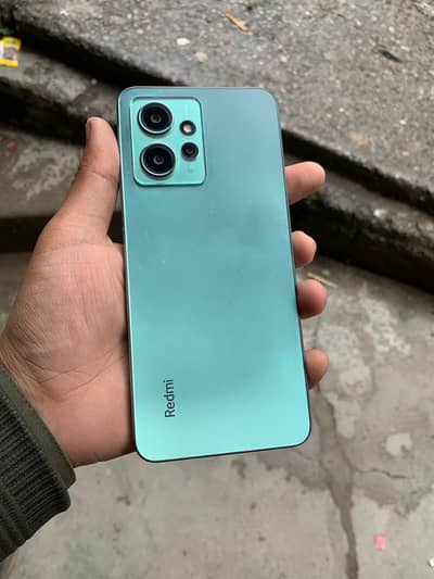 Redmi note 12.  with box and charger.