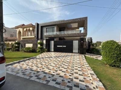 Exclusive Corner Listing: 22 Marla Fully Furnished  Headline: Luxury Corner Mansion for Sale 60 Ft Wide Road Fully Furnished  Location: Prime Corner Plot on 60 Feet Main Road.