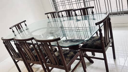 8  Seater Glass top dinning table
