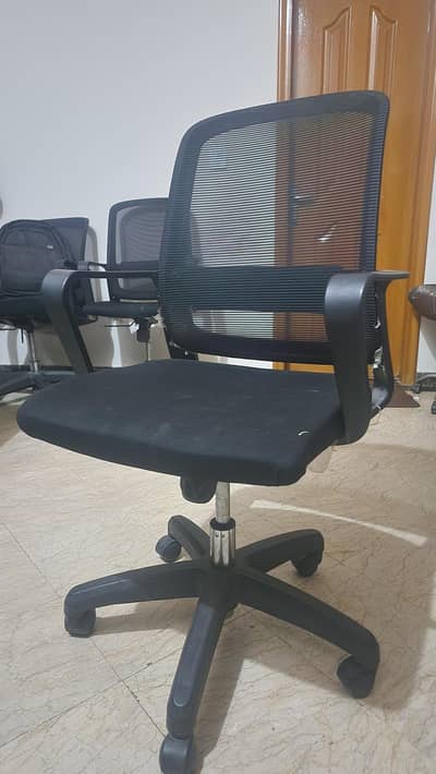 2 office chair 1 Black leather executive chairs available 6000 each.