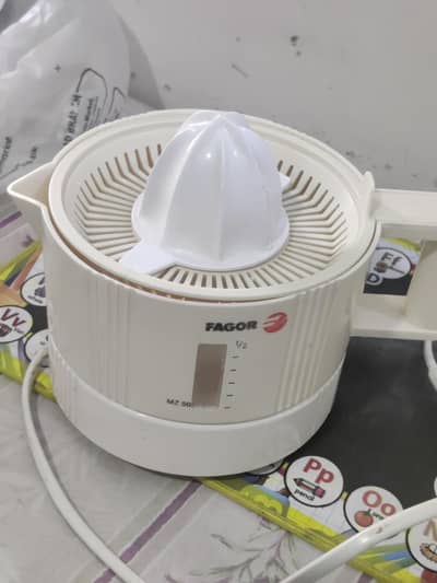 citrus and juicer both in working