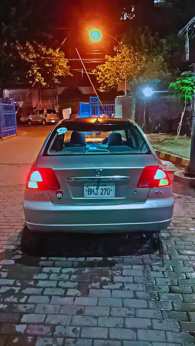 Honda civic EXI 03 model. Rims,powr steering,windows,LED 03065746769