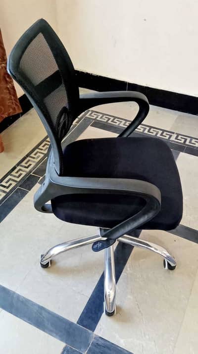 Revolving Comfortable, back support office chair.