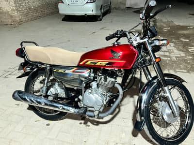 Honda 125 SE red colour sukkur number