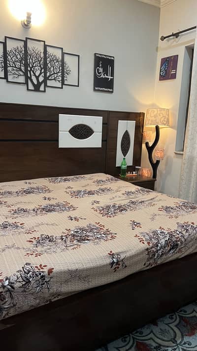 Bed with side tables and dressing