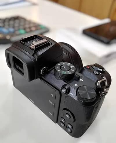 Nikon z50 with 16-50mm lens ( complete box)