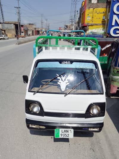 Suzuki , 88 model,  white color, Lahore number , Peshawar Permit.
