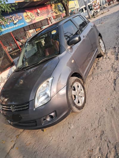 suzuki swift 2012 model 1.3 dlx is available in good condition