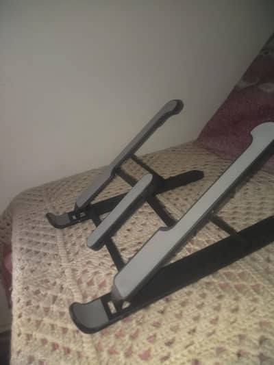 adjustable laptop stand in new condition
