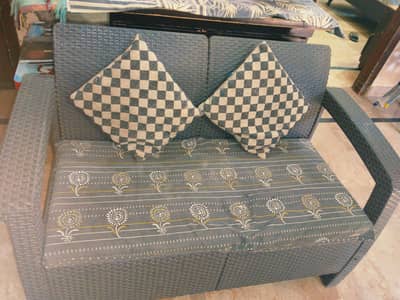 it's a black combination sofa for tv launch or livivg room