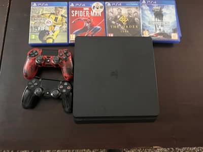 ps4 slim with two controllers and 9 games 500 gb