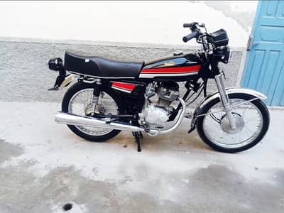 Honda bike125cc03251410662urgent for sale model 2003