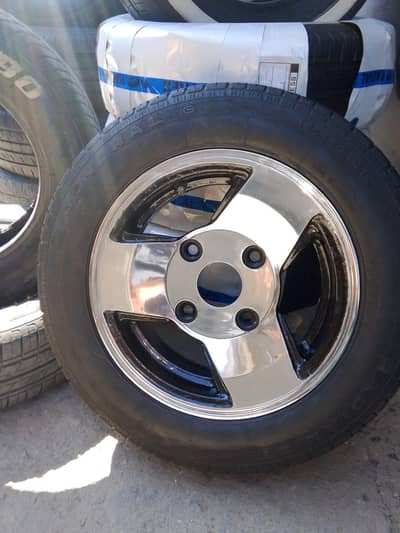 Alloy rims with tyres for mehran and bolan