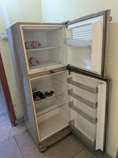 medium size fridge urgent sale.