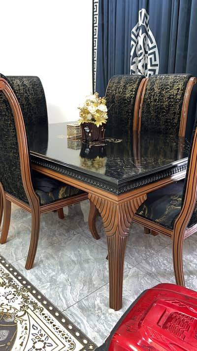 Imported dining table and 6 chairs available for sole