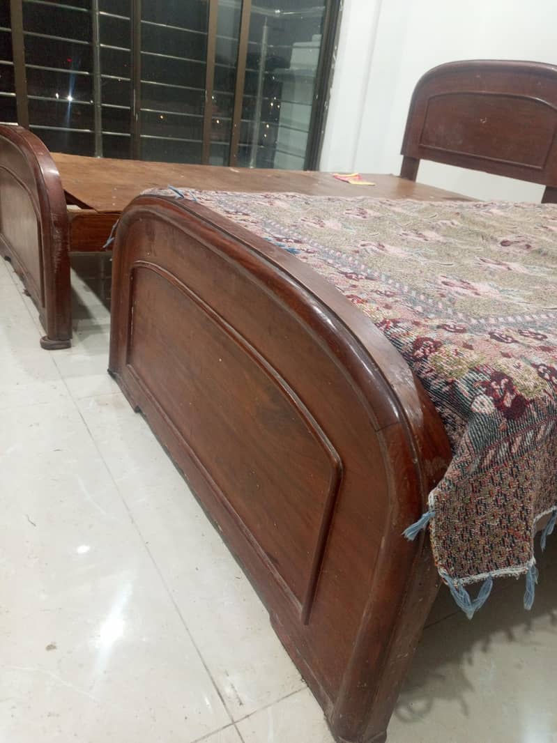 2 single beds solid wood 2