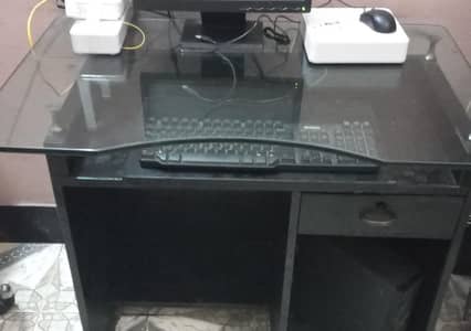 black computer table with heavy glass