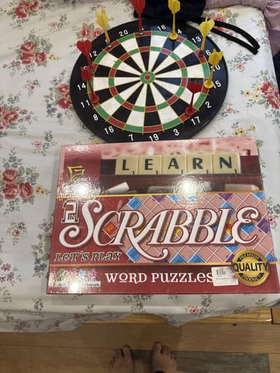 Scrabble and dart board  1500 for dart board and 2000 for scrabble