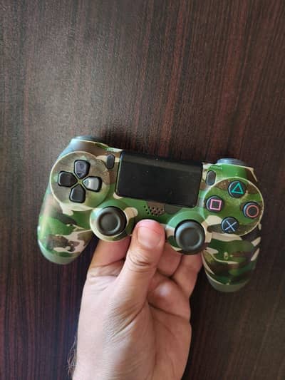 play station controller and charger dock available