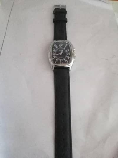 Tomi branded watch