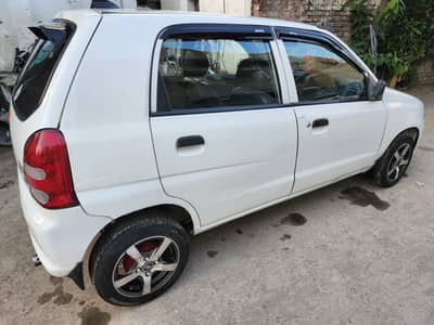 Suzuki Alto 2010 model on cheap price 12.25 total genine family used