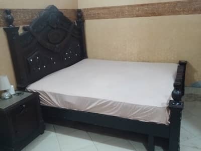 King size double bed with 8 inch spring mattress and 1 side table