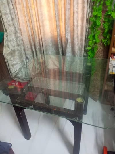 2 single beds 1 cuboard and 4 seater daining table