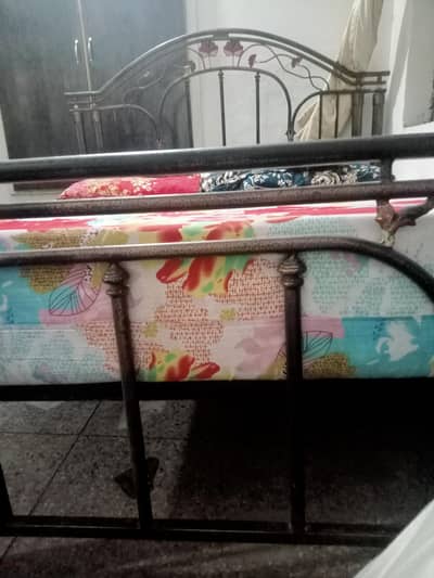 iron bed with metres