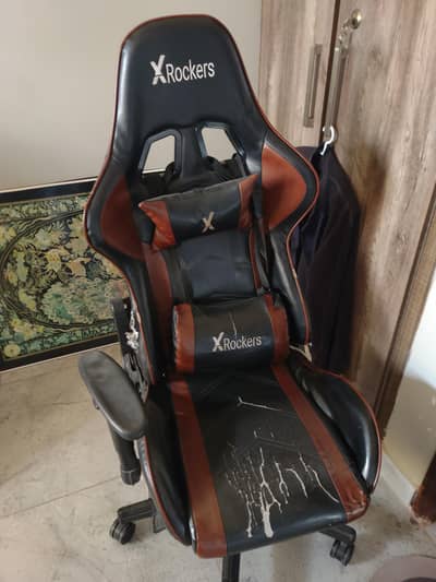 x rocker gaming chair. damaged