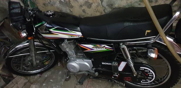 Honda 125 total jeniune 03224577819